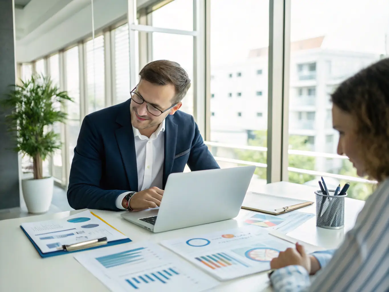 An image of a business owner collaborating with an AI consultant over a digital interface displaying strategic plans.